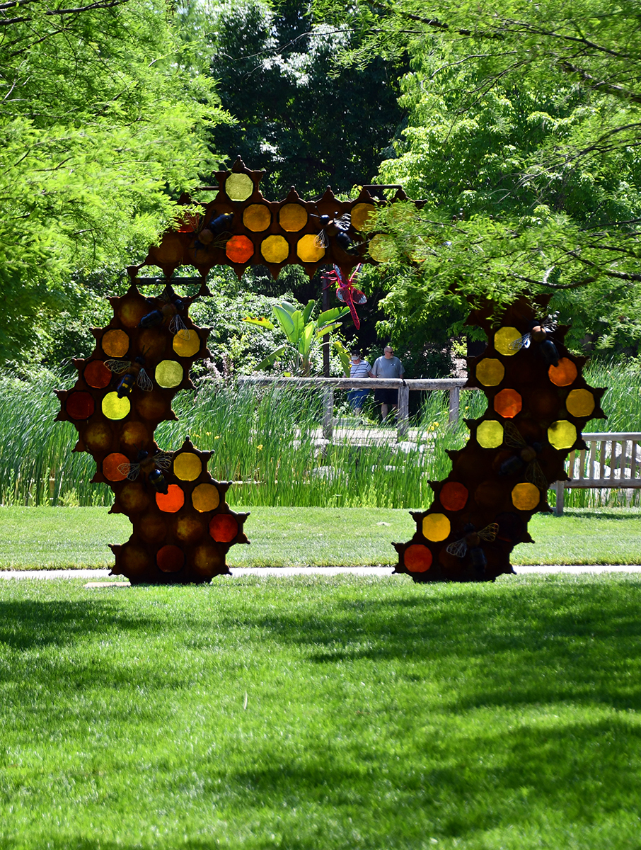 Glass in Flight sculpture exhibit stained glass bee arch